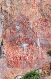 The Huashan Cliff Paintings are located along the Zuo River in Guangxi Province and are believed to be around 2000 years old. There are 60 paintings in all with a grand total of 1,770 human figures. The paintings were executed by the Luoyue people, ancestors of the local Zhuang minority.<br/><br/>

The Zuojiang or Zuo River (Chinese: 左江; pinyin: ZuǒJiāng; literally 'Left River') is a river in Guangxi Province, southern China. It flows into the South China Sea.