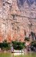 China: Boat below the Huashan Cliff Paintings (Huashan Bihua), Zuo River (Zuo Jiang), Longrui Nature Reserve, Guangxi Province